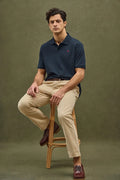 Navy blue short-sleeved polo shirt