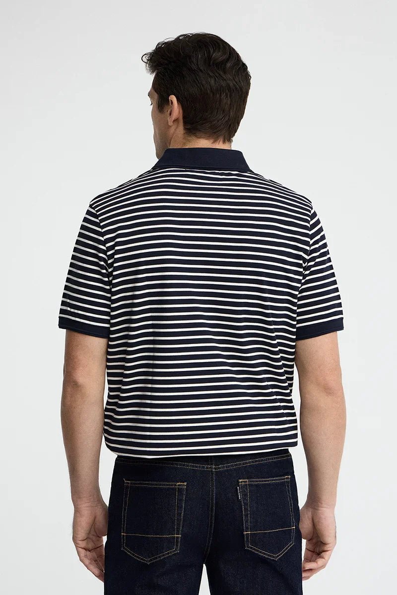 Navy and ecru striped polo shirt
